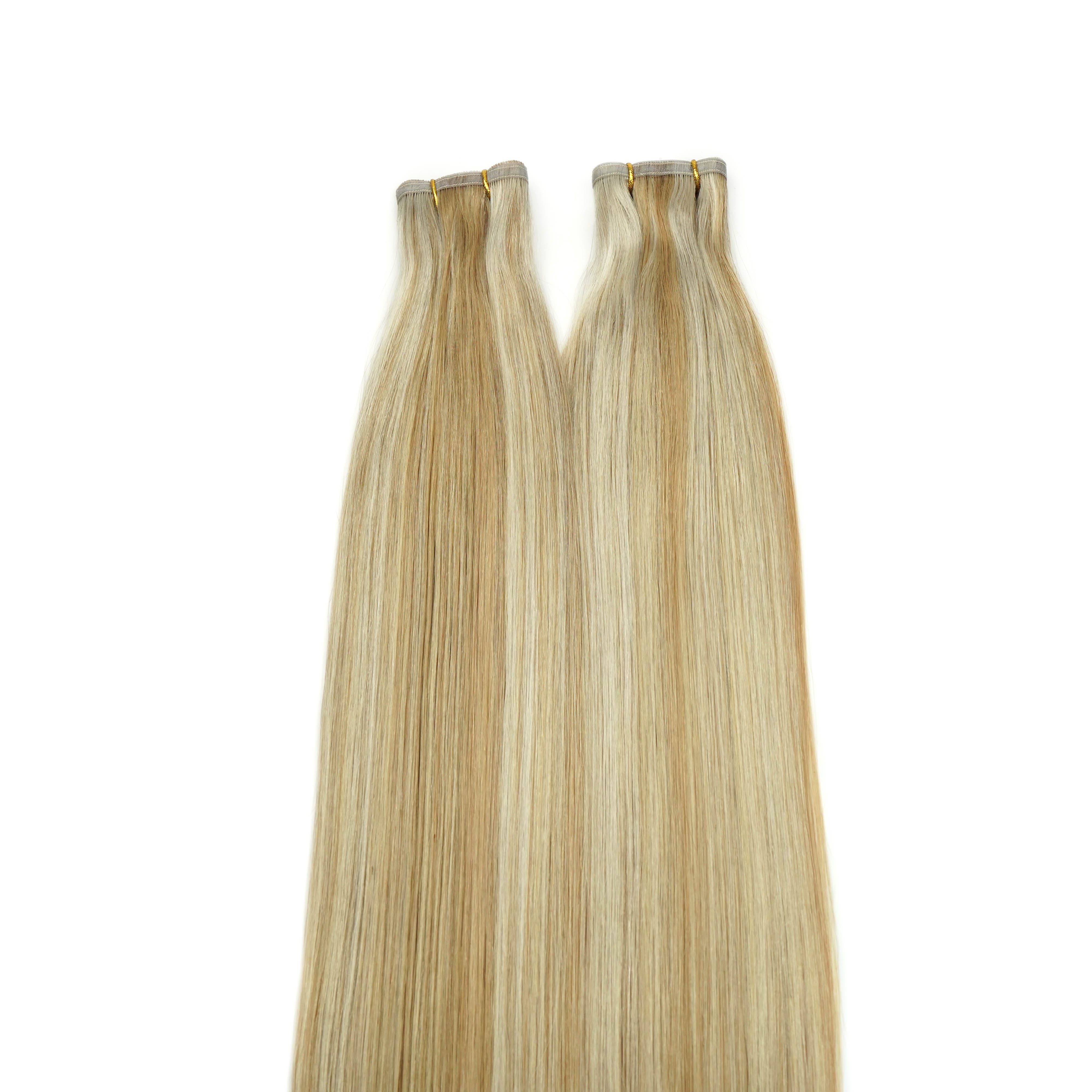 Flat seam weft hair extensions in dimensional blonde shade for smooth placement