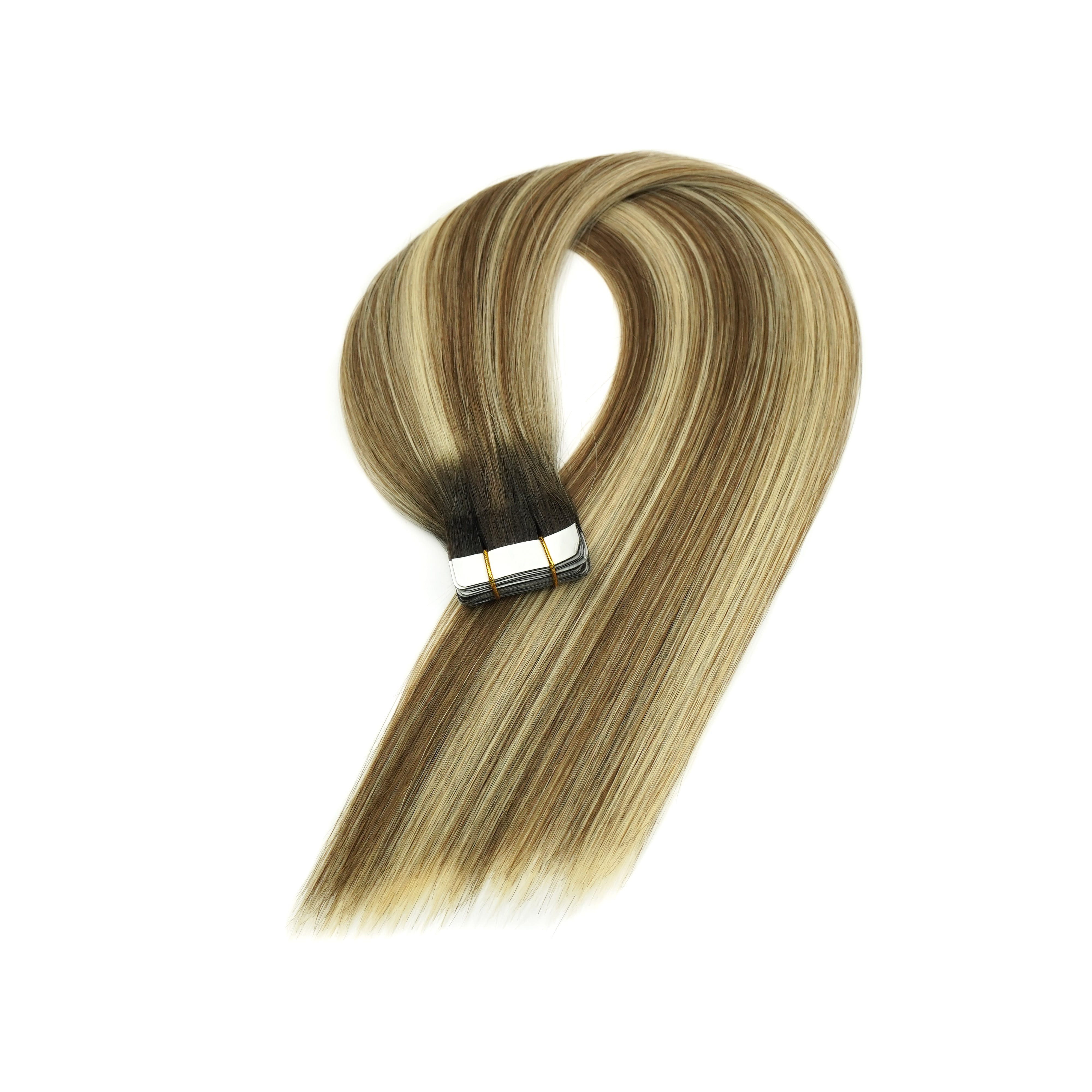 Tape in Remy human hair extensions with flat adhesive tabs for salon color placement